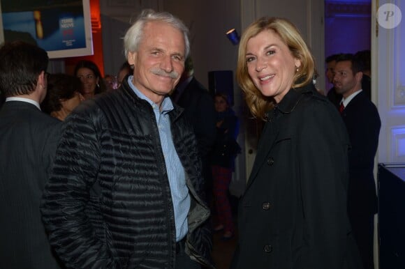 Yann Arthus-Bertrand et Michèle Laroque à la soirée des 80 ans d'Air France, à Paris, le 7 octobre 2013.