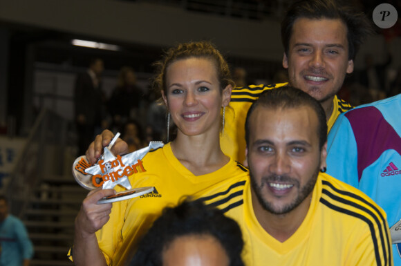 Lorie, Merwan Rim et Brice Conrad à la 7e édition du Foot Concert, au profit de l'association Huntington Avenir au Palais des sports de Lyon, le 12 octobre 2013.