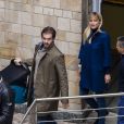 Tomaso Trussardi et Michelle Hunziker sortent de l'hôpital à Milan où cette dernière a accouché d'une petite fille, prénomée Sole, le 13 octobre 2013.