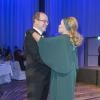 Le prince Albert II de Monaco danse avec l'icône Ursula Andress lors de la soirée de gala de la fondation Albert II de Monaco organisée à Berne en Suisse le 17 octobre 2013