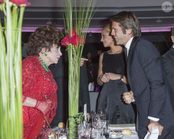 Gina Lollobrigida et le prince Emmanuel Philibert de Savoie  lors de la soirée de gala de la fondation Albert II de Monaco organisée à Berne en Suisse le 17 octobre 2013