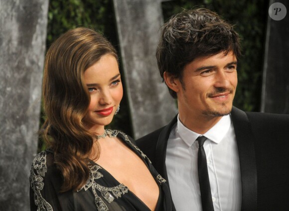 Miranda Kerr et Orlando Bloom arrivent à la soirée des Oscars organisée par le magazine Vanity Fair  le 24 février 2013.