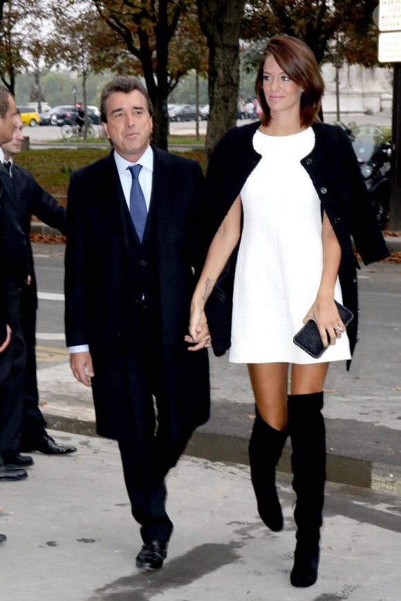 Arnaud Lagardère et Jade Foret - Arrivées des people au défilé Chanel printemps-été 2014. Paris, le 1er octobre 2013.