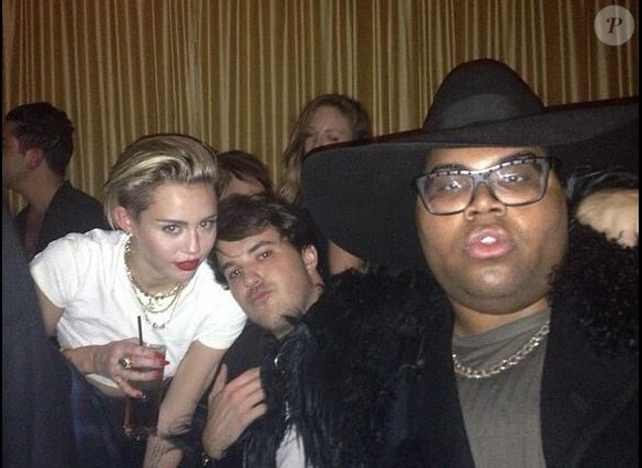 Miley Cyrus et E.J. Johnson en soirée à New York, le 26 octobre 2013.