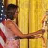 La First Lady américaine Michelle Obama a eu droit à un cours de danse façon Bollywood lors d'une fête pour Diwali, à la Maison-Blanche, le 5 novembre 2013.