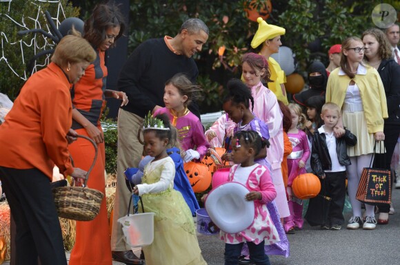 Barack Obama et Michelle Obama fêtent Halloween à la Maison-Blanche, le 31 octobre 2013.
 