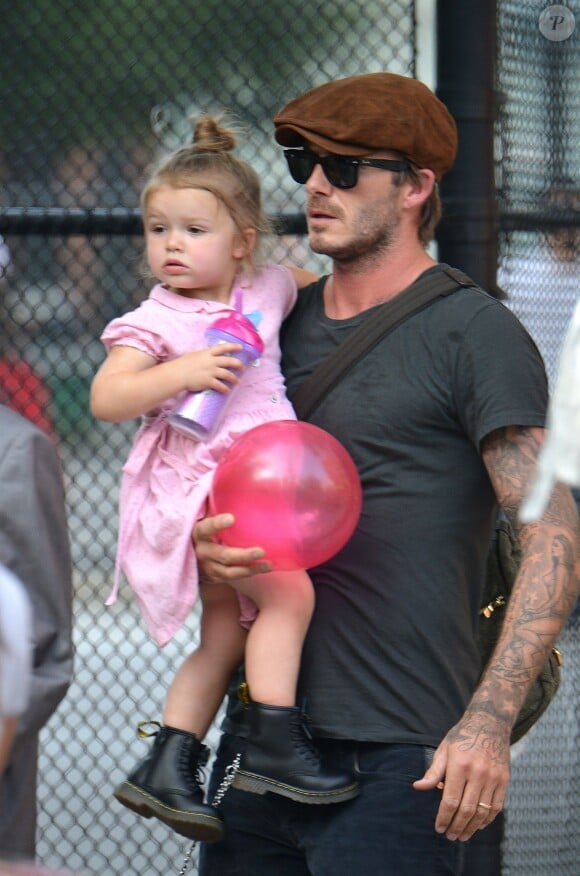 David Beckham et sa fille Harper dans un parc de New York, le 10 septembre 2013