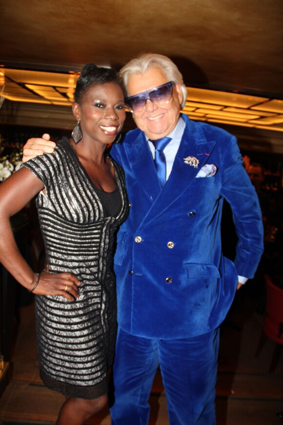 Surya Bonaly et Michou - Soirée d'inauguration du bistrot chic "Le Napoleon" sur les Champs-Elysées à Paris le 6 novembre 2013.