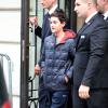 René-Charles, le fils aîné de Céline Dion, sort de son hôtel parisien, le 12 novembre 2013.