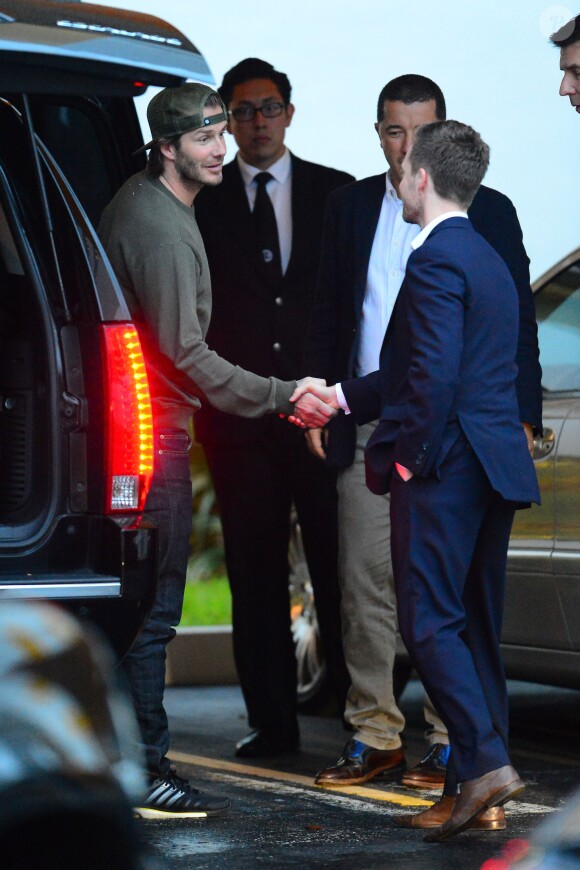 David Beckham a déjeuné au restaurant Zuma avec le Bolivien Marcelo Claure, son potentiel partenaire dans le rachet de la franchise de football de Miami. Miami, le 13 novembre 2013.