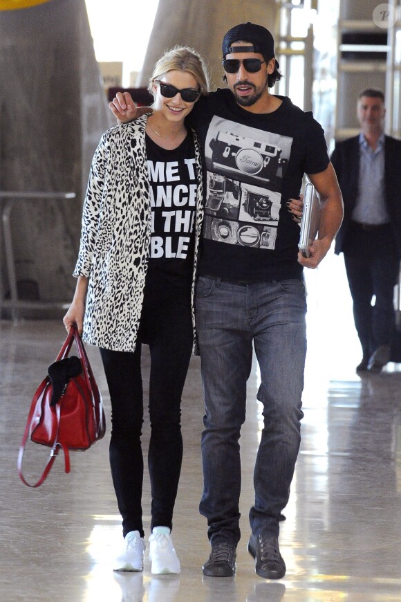 Exclusif - Sami Khedira et sa compagne Lena Gercke à Madrid le 6 novembre 2013.