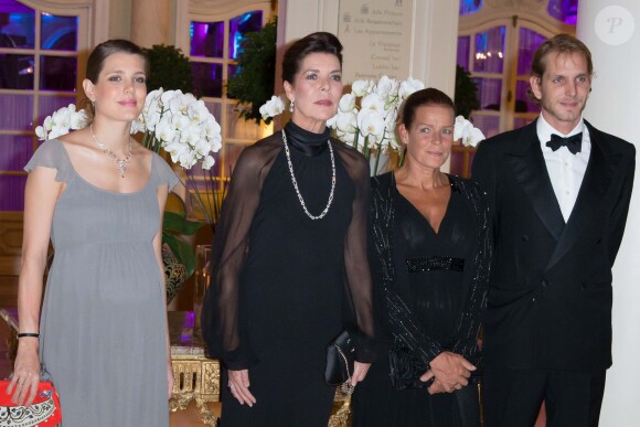 Charlotte Casiraghi (enceinte), Caroline de Hanovre, Stéphanie de Monaco et Andrea Casiraghi lors du dîner de gala des 50 ans de l'association AMADE Mondiale à l'hôtel Hermitage de Monaco le 4 octobre 2013.