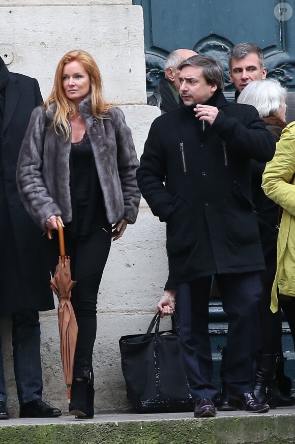 Exclusif - Céline Boisson et Frédéric Martin lors des obsèques du grand ami de Jacques Martin, Paul Ceuzin, en l'église Saint-Roch à Paris, le 19 novembre 2013