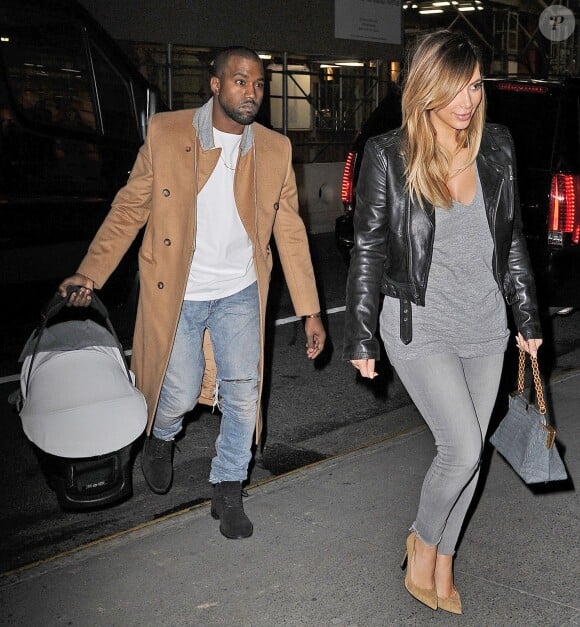 Kanye West, Kim Kardashian et leur fille North à New York, le 22 novembre 2013.