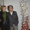 Marie-Christiane Marek et Kenzo Takada lors de la 18e édition de l'opération Sapins de Noël des Créateurs à l'hôtel Salomon de Rothschild à Paris, le 3 décembre 2013.