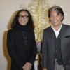 Massato et Kenzo Takada lors de la 18e édition de l'opération Sapins de Noël des Créateurs à l'hôtel Salomon de Rothschild à Paris, le 3 décembre 2013.