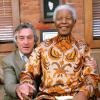 Nelson Mandela posant avec Robert de Niro à New York en 2005