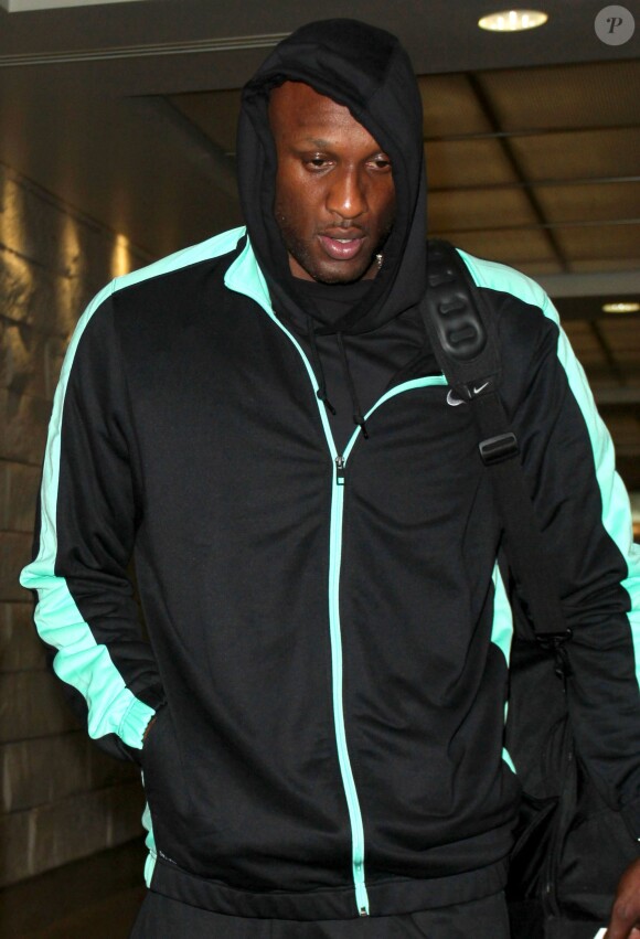 Lamar Odom lors de son arrivée à l'aéroport LAX de Los Angeles le 27 novembre 2013