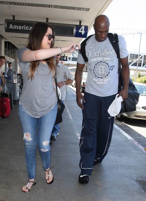 Khloé Kardashian et son époux Lamar Odom à l'aéroport de Los Angeles le 17 juillet 2012