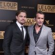 Leonardo DiCaprio et Jean Dujardin à la première mondiale du film Le loup de Wall Street au cinéma Gaumont Opéra Capucines à Paris, le 9 décembre 2013.