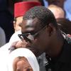 Sandrine Diouf et Omar Sy, aux obsèques de Mouss Diouf, le 9 juillet 2012, à Auriol.