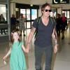 Nicole Kidman et Keith Urban à l'aéroport de Sydney en Australie avec leurs enfants Faith Margaret et Sunday Rose, en route pour les Etats-Unis, le 2 janvier 2014 : le chanteur tient par la main sa fille Sunday Rose qui a bien grandi !