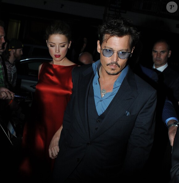 Johnny Depp avec sa compagne Amber Heard au C Restaurant à Mayfair, à Londres le 21 juillet 2013