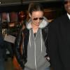 Olivia Wilde (enceinte) et son fiancé Jason Sudeikis arrivent à Los Angeles en provenance de New York, le 5 janvier 2014.