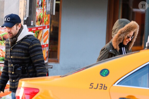 Jason Sudeikis et sa fiancée Olivia Wilde (enceinte) à New York, le 4 janvier 2014.
