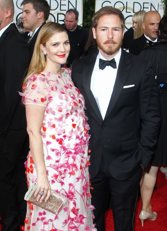 Drew Barrymore enceinte et son mari Will Kopelman lors des Golden Globes à Beverly Hills le 12 janvier 2014.