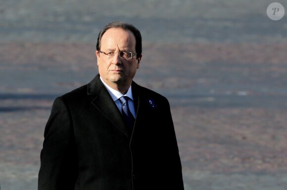 François Hollande lors de la cérémonie commémorative du 95e anniversaire de l'Armistice du 11 novembre 1918 au pied de l'Arc de Triomphe à Paris, le 11 novembre 2013