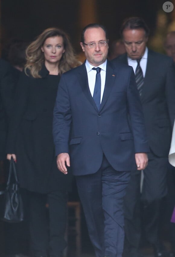 Valérie Trierweiler et François Hollande lors des obsèques de Patrice Chereau en l'église Saint-Sulpice de Paris le 16 octobre 2013