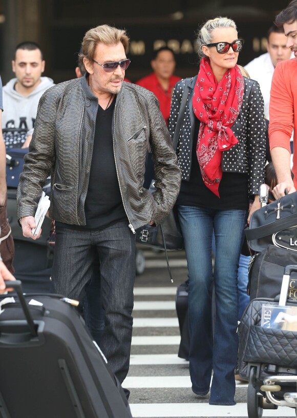 Johnny et Laeticia Hallyday de retour à Los Angeles, le 12 janvier 2014.