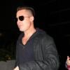 Brad Pitt, à la cool et stylé avec sa nouvelle coupe de cheveux, arrive à l'aéroport LAX à Los Angeles, le 17 janvier 2014.