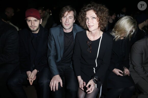 Hugo Becker, Thomas Dutronc et Catherine Vautrin assistent au défilé Cerruti automne-hiver 2014-2015. Paris, le 17 janvier 2014.