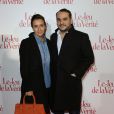 François-Xavier Demaison et sa femme Emmanuelle -lors de l'avant-première du Jeu de la vérité au Gaumont Opéra Capucines à Paris le 20 janvier 2014