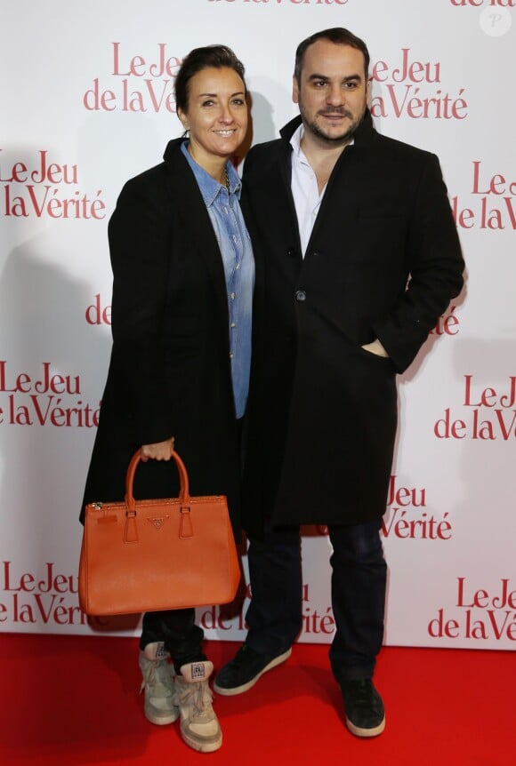 Francois-Xavier Demaison et sa femme Emmanuelle lors de l'avant-première du Jeu de la vérité au Gaumont Opéra Capucines à Paris le 20 janvier 2014