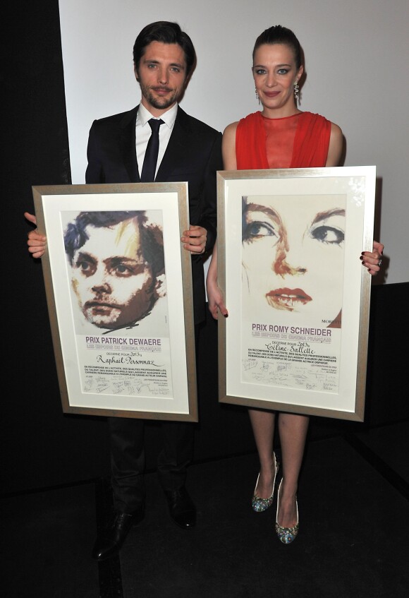 Raphaël Personnaz (Lauréat du prix Patrick Dewaere 2013) et Céline Sallette (Lauréate du prix Romy Schneider 2013) à Paris pour la 32e édition, le 11 mars 2013.