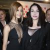 Zahia Dehar et Béatrice Dalle lors du Dîner de la mode pour le Sidaction au Pavillon d'Armenonville à Paris, le 23 janvier 2014.