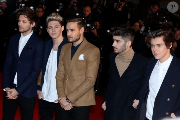 Louis Tomlinson, Niall Horan, Liam Payne, Zayn Malik, Harry Styles des One Direction - 15e édition des NRJ Music Awards à Cannes. Le 14 décembre 2013.