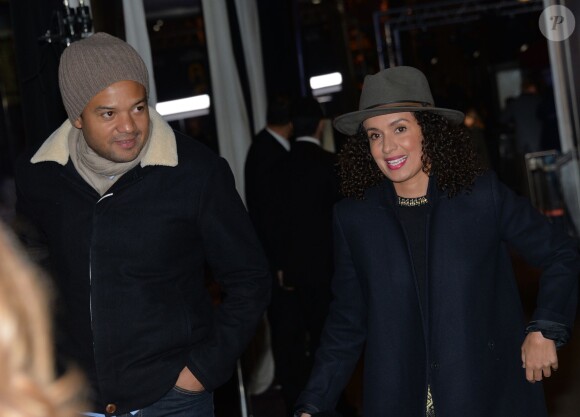 Fabrice Eboué et sa compagne Amelle Chahbi arrivent à la première du film American Bluff à l'UGC Normandie, Paris, le 3 février 2014.