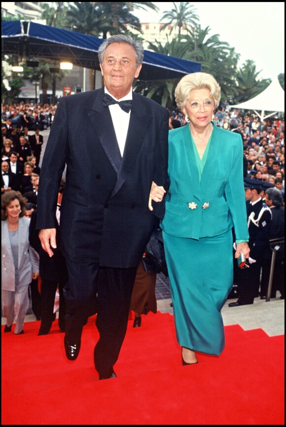 Roger Hanin et son épouse, la productrice Christine Gouze-Rénal, au Festival de Cannes, mai 1994.
