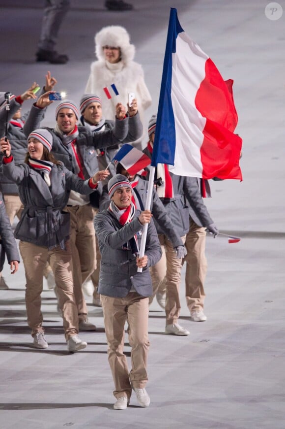 La délégation française, menée par le skieur Jason Lamy-Chappuis, pénètre dans le stade olympique de Fisht - Cérémonie d'ouverture des Jeux olympiques de Stochi, le 7 février 2014.