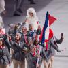 La délégation française, menée par le skieur Jason Lamy-Chappuis, pénètre dans le stade olympique de Fisht - Cérémonie d'ouverture des Jeux olympiques de Stochi, le 7 février 2014.