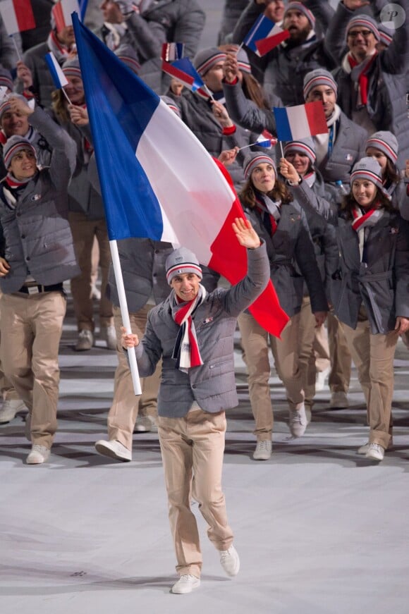 La délégation française, menée par le skieur Jason Lamy-Chappuis, pénètre dans le stade olympique de Fisht - Cérémonie d'ouverture des Jeux olympiques de Stochi, le 7 février 2014.