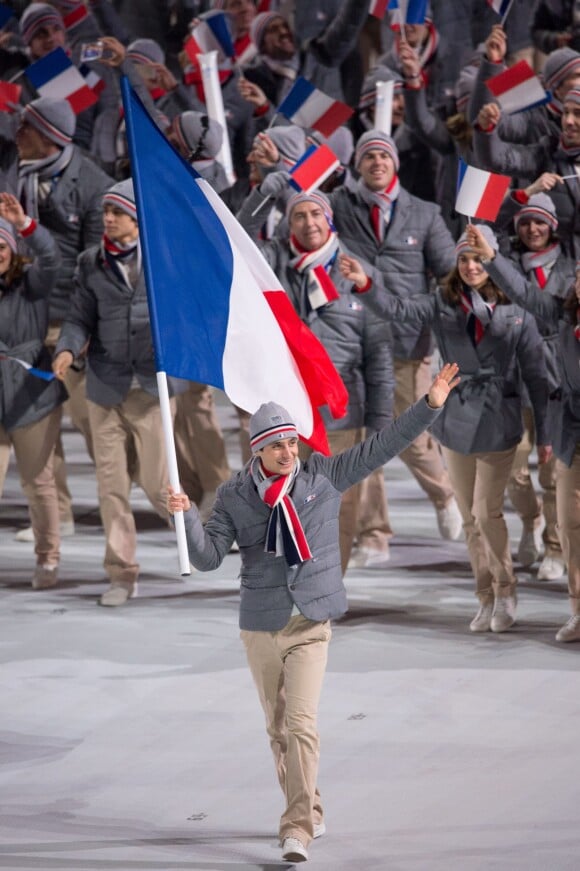 La délégation française, menée par le skieur Jason Lamy-Chappuis, pénètre dans le stade olympique de Fisht - Cérémonie d'ouverture des Jeux olympiques de Stochi, le 7 février 2014.