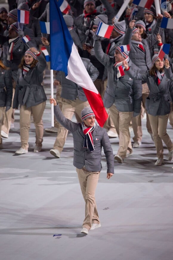 La délégation française, menée par le skieur Jason Lamy-Chappuis, pénètre dans le stade olympique de Fisht - Cérémonie d'ouverture des Jeux olympiques de Stochi, le 7 février 2014.
