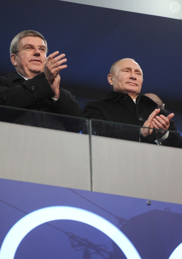 Le président du CIO Thomas Bach, le president Russe Valdimir Poutine - Cérémonie d'ouverture des XXIIème jeux olympiques d'hiver à Sotchi en Russie le 7 février 2014.  ITAR-TASS: SOCHI, RUSSIA. FEBRUARY 7, 2014. International Olympic Committee (IOC) president Thomas Bach (L) and Russia's President Vladimir Putin applaud during the opening ceremony of the Sochi 2014 Olympic Games, at the Fisht Olympic Stadium. (Photo ITAR-TASS/ Mikhail Klimentyev)08/02/2014 - Sotchi