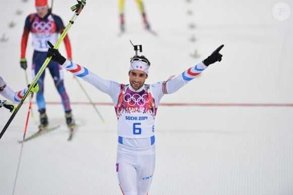 Martin Fourcade après sa victoire sur l'épreuve de poursuite aux JO de Sotchi au Laura Cross-country Ski & Biathlon Center de Krasnaya Polyana, le 10 février 2014
