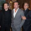 Matt Damon, Jean Dujardin et George Clooney lors du photocall du film "Monuments Men" à l'hôtel Bristol à Paris le 12 février 2004.